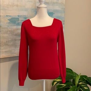 Sparkly red sweater.